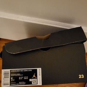 Jordan Why Not Zero.3 (PS), Size 1Y, and Black, White, & Hints of Red in Color